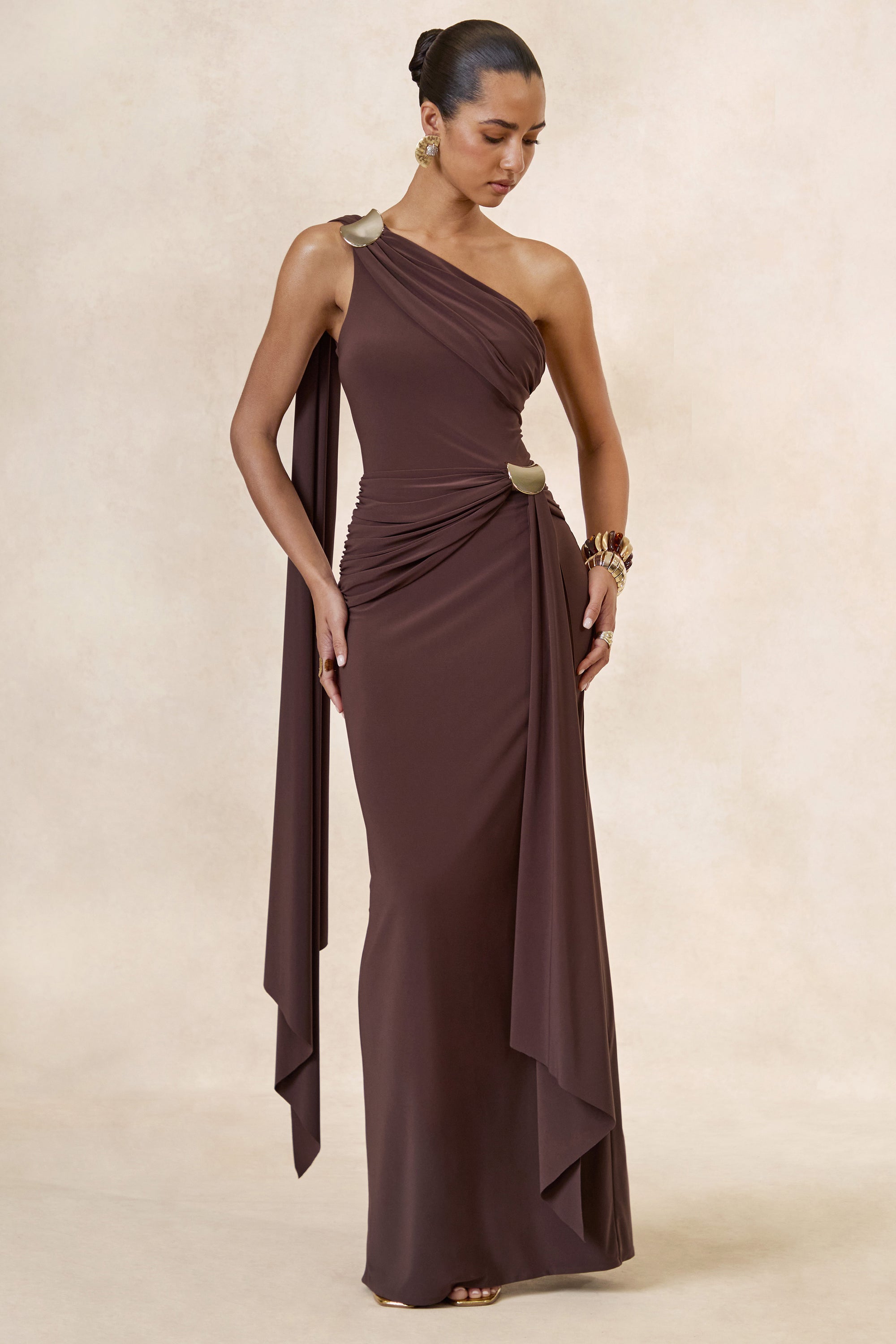 CL138426022 - Sariah _ Dark Brown Asymmetric-Neck Maxi Dress With Gathered Detailing And Gold Details0.jpg