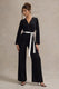 Ruba | Zwarte Getailleerd Diepe hals Jumpsuit Met Gestrikte Taille
